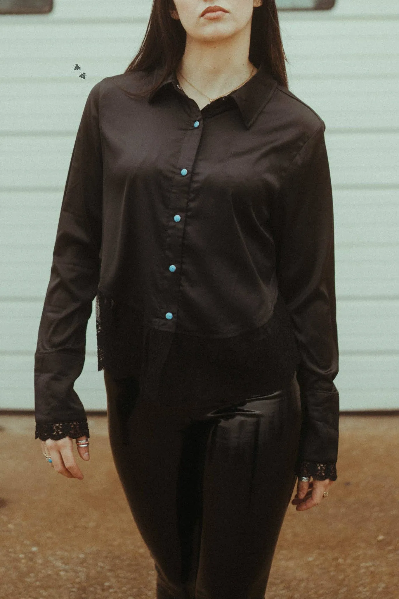 Black long sleeve top with lace hem