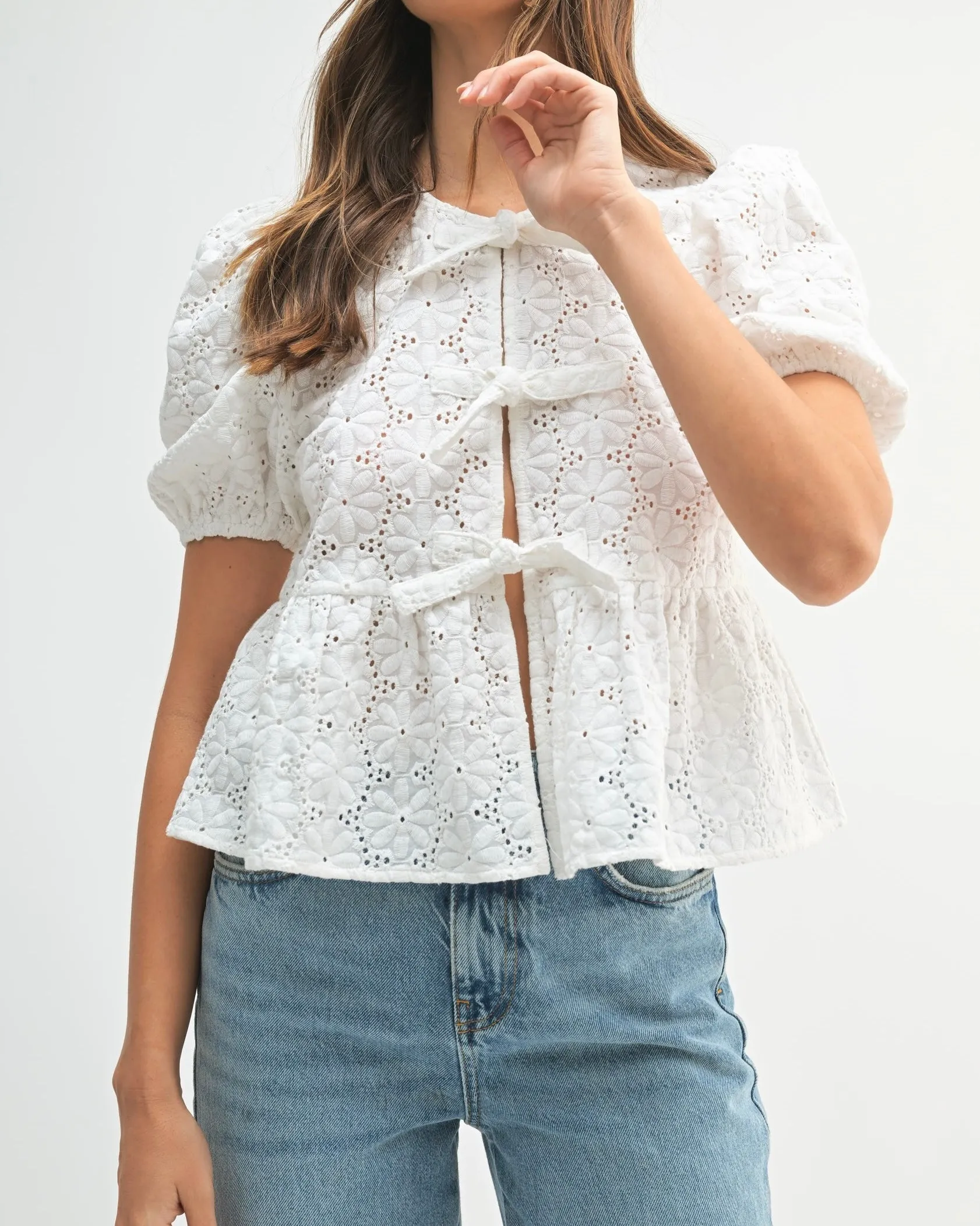 Eyelet Puff Sleeve Bottom Ruffle Front Tie Top in Off White