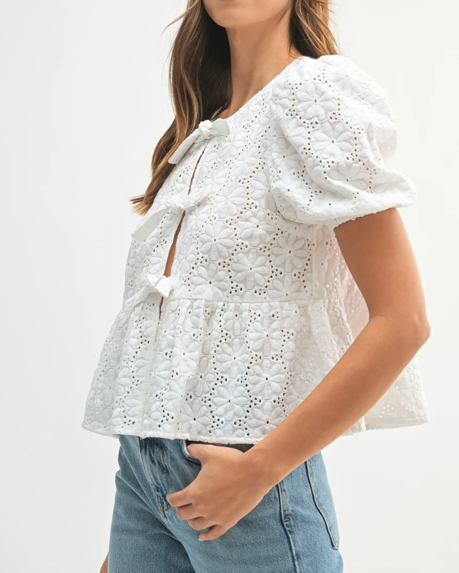 Eyelet Puff Sleeve Bottom Ruffle Front Tie Top in Off White